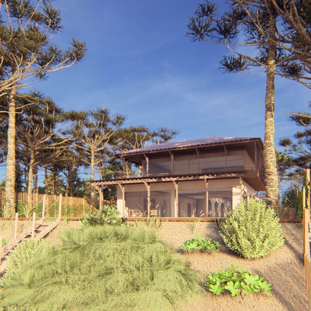 Maison moderne en bois à deux étages parmi des pins araucaria sur une pente ensablée sous un ciel bleu dégagé.